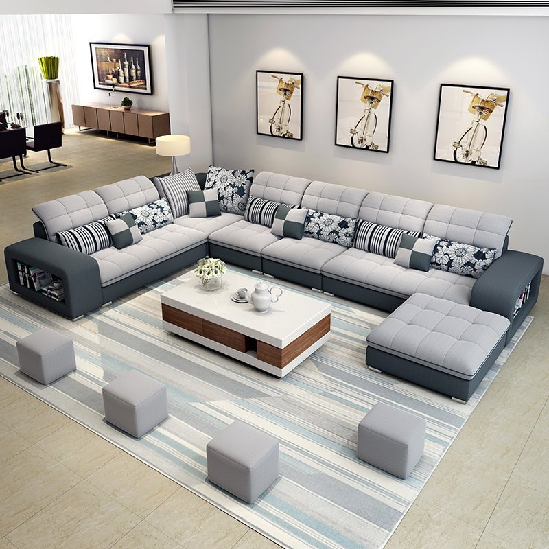 Bộ bàn ghế sofa góc phòng khách của chúng tôi với thiết kế đẹp mắt và tiện nghi, đem lại không gian phòng khách hiện đại và ấm cúng. Với chất liệu bọc nỉ cao cấp và độ bền tốt, sản phẩm của chúng tôi là sự lựa chọn hoàn hảo cho không gian phòng khách của bạn. Hãy tham khảo và mua ngay bộ bàn ghế sofa góc của chúng tôi để tận hưởng sự tiện nghi và thoải mái.